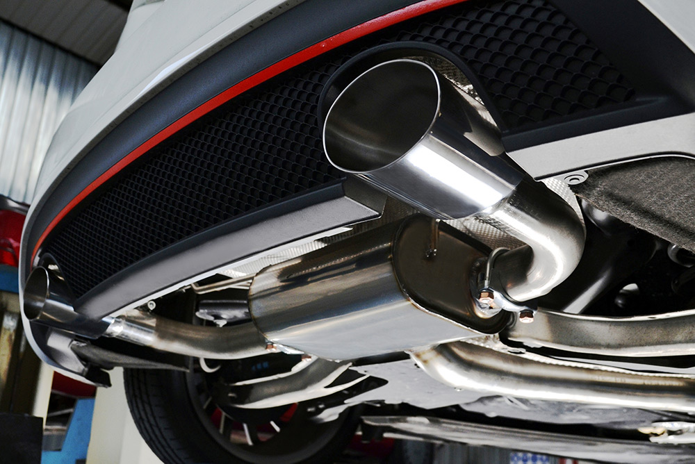 Close up of car exhaust pipe