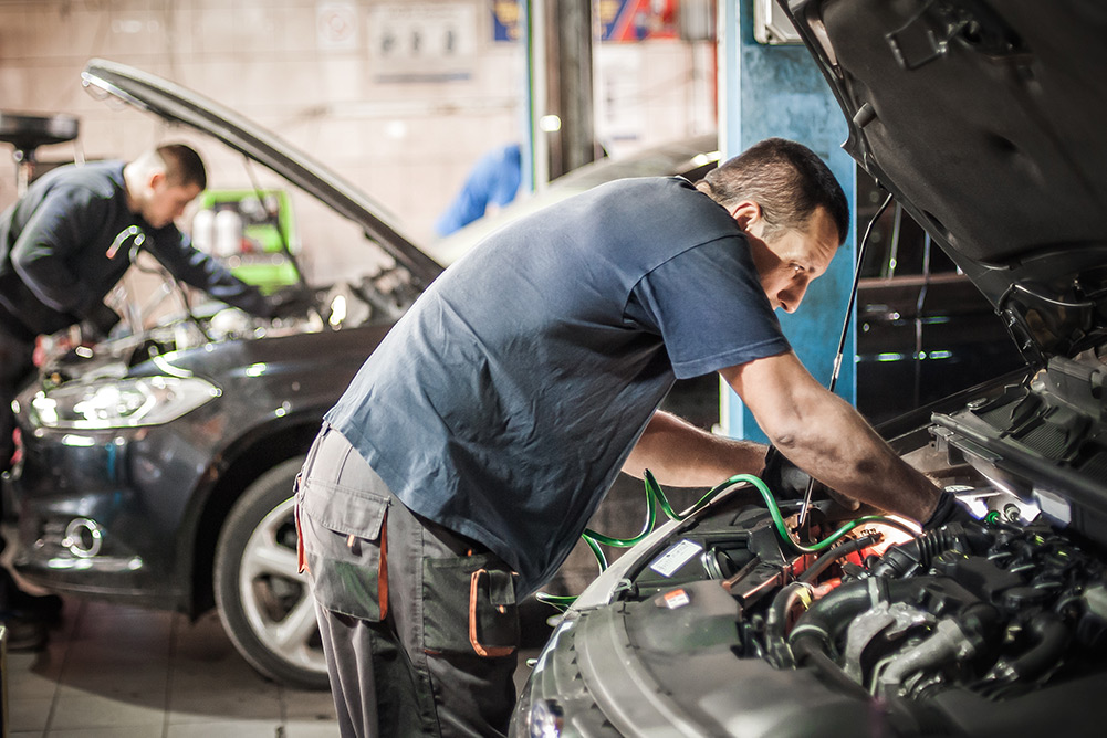 Mechanics repairing cars in Maidstone